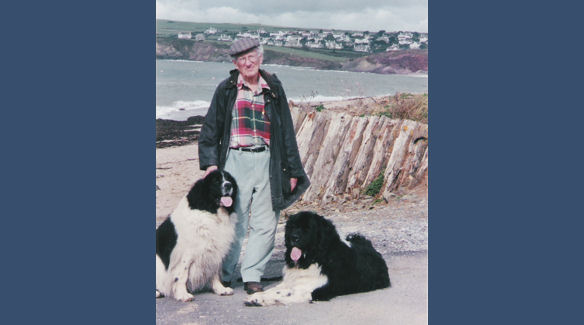 Brian with two Landseers on the beach